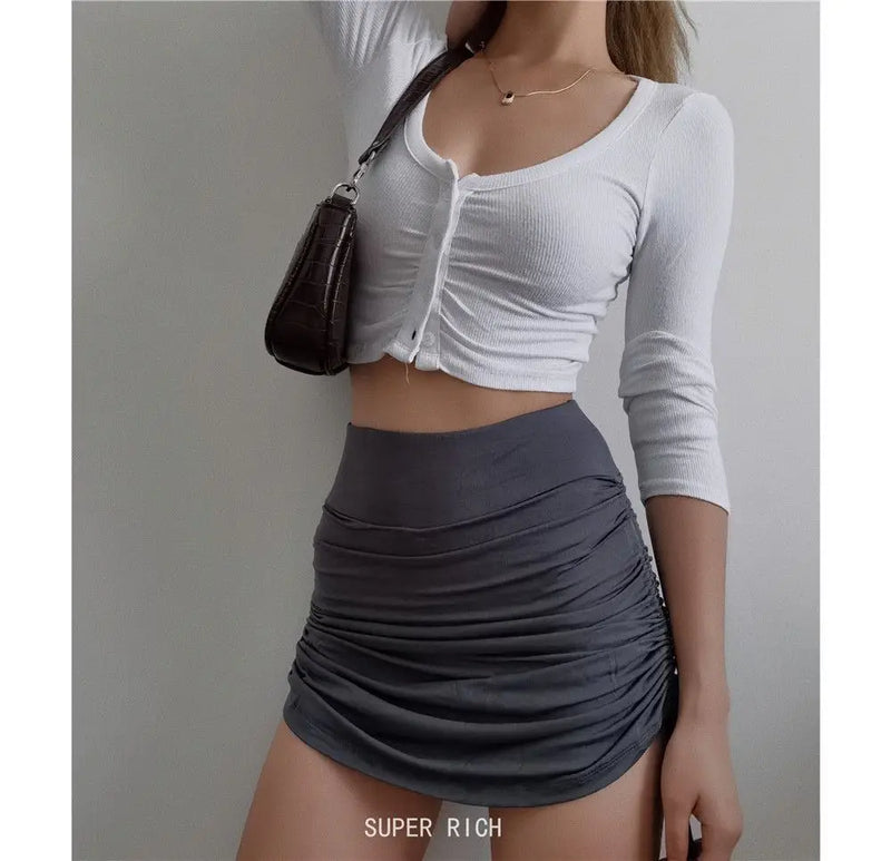 Crop top à manches longues et boutons pour femme